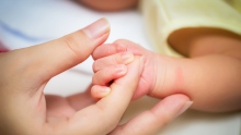 Newborn baby hand - 189680450