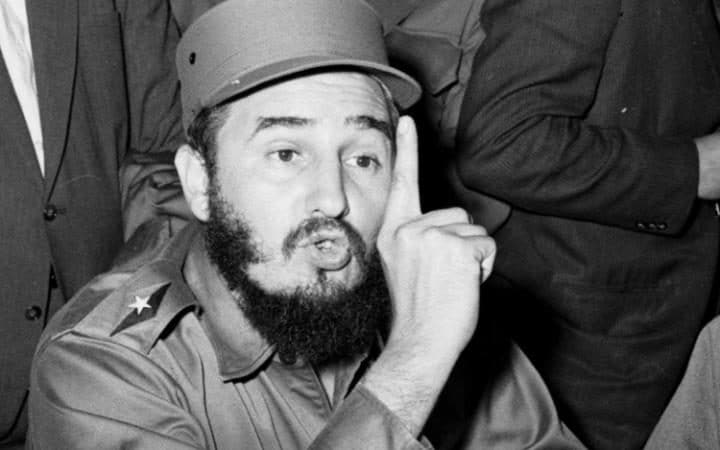 Cuban leader Fidel Castro talks to reporters in New York September 19, 1960