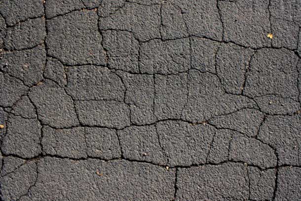 cracked-black-top-asphalt-pavement-texture