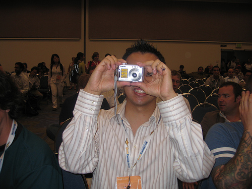 Lucas Ng taking a picture at Search Engine Strategies San Jose