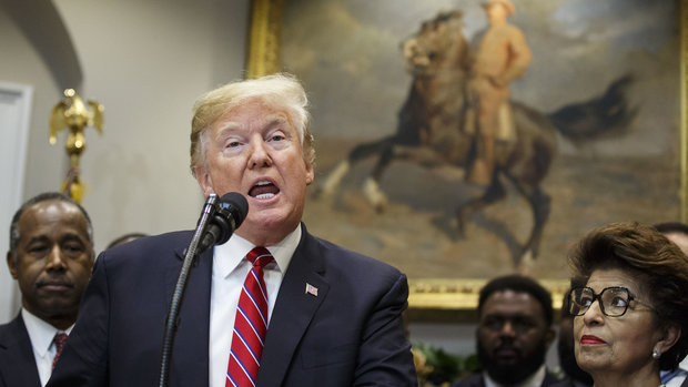 U.S. President Donald Trump speaks during an executive order signing in the Roosevelt Room of the White House in Washington, D.C., U.S., on Wednesday, Dec. 12, 2018. Trump signed an order to create a White House Opportunity and Revitalization Council, directing federal agencies to steer spending toward certain distressed communities across the country called opportunity zone. Photographer: Joshua Roberts/Bloomberg via Getty Images