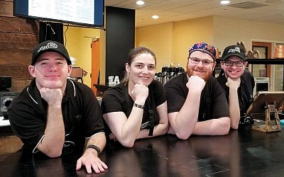 Four of the employees of Lillian’s Café, which just opened in the lobby of the JCC Rockland in West Nyack. The young men are on the autism spectrum.