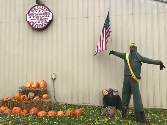 The scarecrow displayed outside Quality Coatings in Fowlerville on Sunday, Oct. 27.