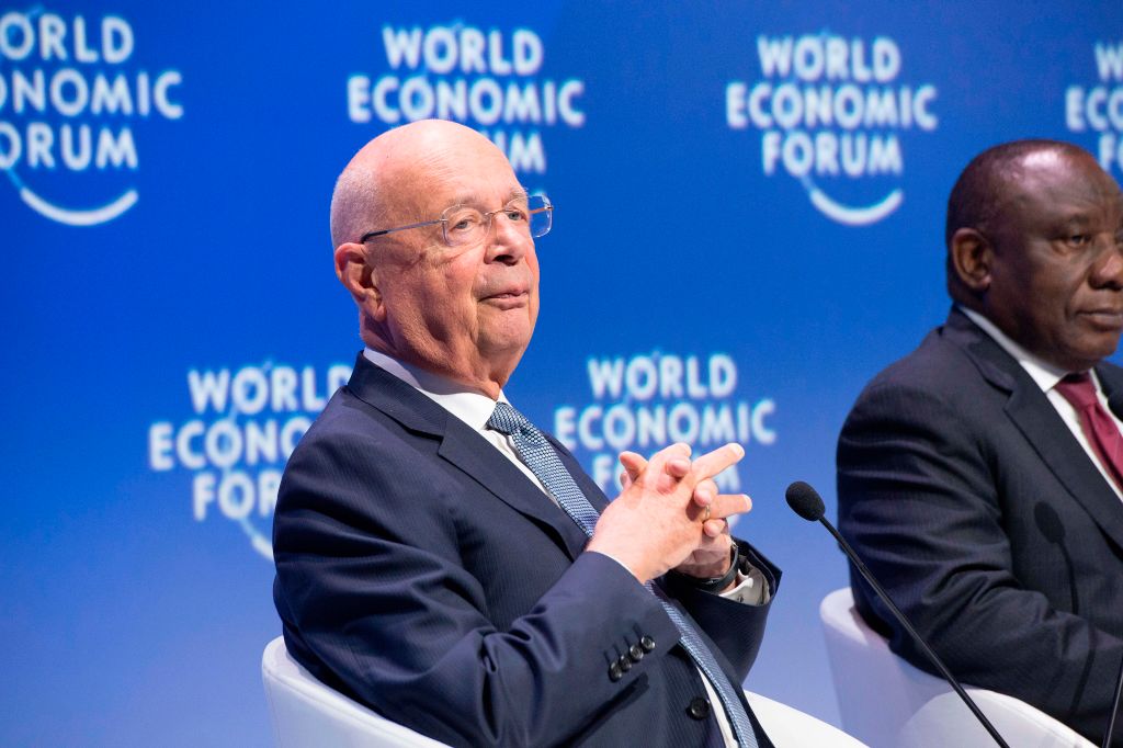 Klaus Schwab, founder of the World Economic Forum sits next to South Africa's President Cyril Ramaphosa, at the plenary session of African Leaders at the World Economic Forum Africa meeting at the Cape Town International Convention Centre, in Cape Town on September 5, 2019.