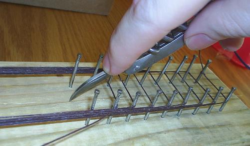 string jig DIY  cutting with knife