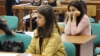 Two of the three sisters accused of killing their father, Angelina Khachaturyan (front) and Krestina Khachaturyan (back), at a court hearing in Moscow. (file photo)