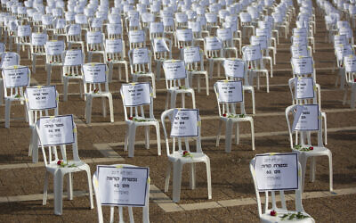 One thousand chairs symbolizing people who died from the coronavirus are placed at the Rabin Square in Tel Aviv, Sept. 7, 2020 (AP Photo/Sebastian Scheiner)