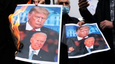 Pictures of Donald Trump and Joe Biden are burned at a protest in Tehran against the killing of top nuclear scientist Mohsen Fakhrizadeh (Nov 2020)