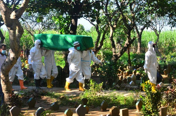 A funeral in Kudus, Indonesia, in May. Many of the countries that are experiencing fresh coronavirus outbreaks despite high inoculation rates relied on Chinese-made vaccines.