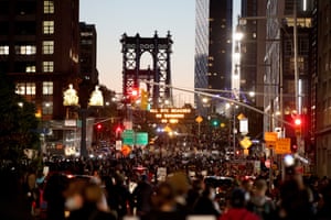 Activists march over the Manhattan bridge during a rally on May 31, 2020 in the Brooklyn borough of New York City. Protesters demonstrated for the fourth straight night after video emerged of a Minneapolis police officer, Derek Chauvin, pinning Floyd’s neck to the ground. Floyd was later pronounced dead while in police custody after being transported to Hennepin County Medical Center. The four officers involved have been fired and Chauvin has been arrested and charged with 3rd degree murder.