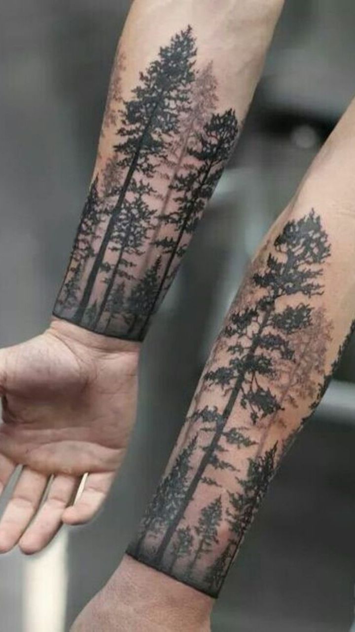 hình ảnh rừng cây được khác trên cánh tay người đàn ông - hình xăm nam giới - 2019 - elle man
