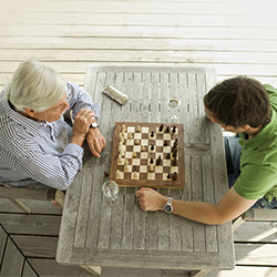 couple playing chess together