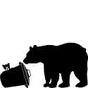 Silhouette of a bear tipping over a trash can