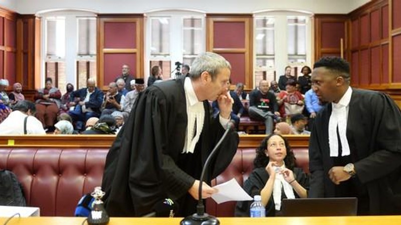 The Haron family’s lawyer at the inquest, Howard Varney, with NPA advocate Lifa Matybeni. Picture: Phando Jikelo/African News Agency