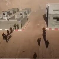 Hamas terrorists seen training to attack Israel in a mock kibbutz built in Gaza (Screencapture/YouTube: used in accordance with Clause 27a of the Copyright Law)